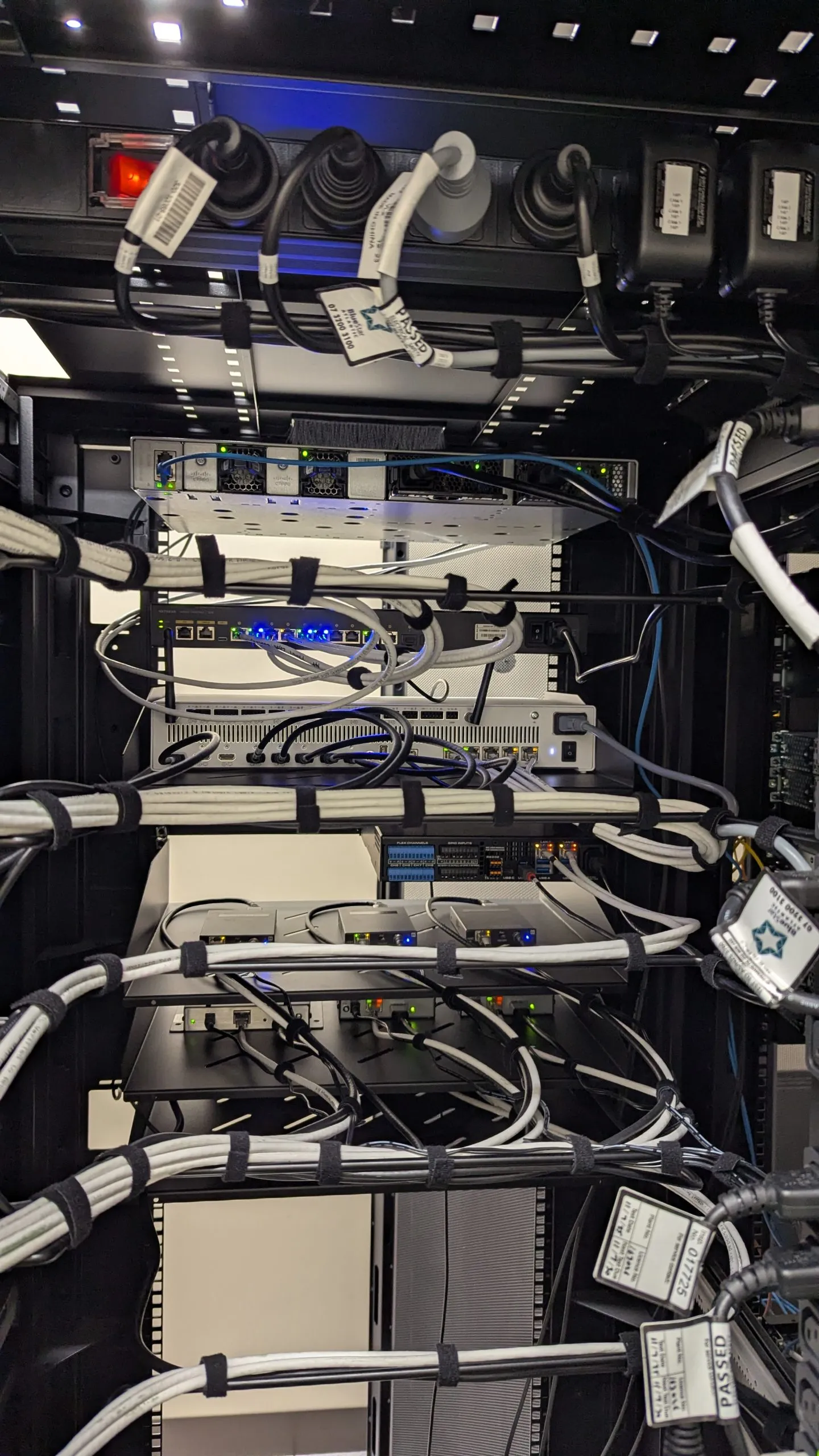 Inside a commissioned Focus AV rack — dressed looms, labelled and tested
