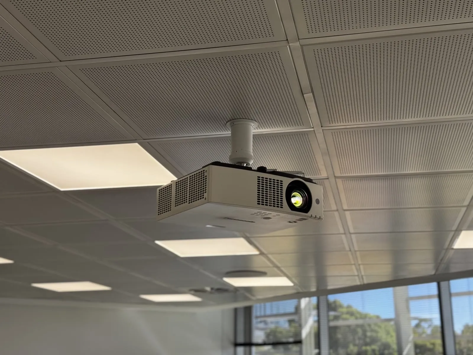 Tiered collaborative teaching space at ECU Joondalup with repeated wall displays and zoned audio, fitted out by Focus AV