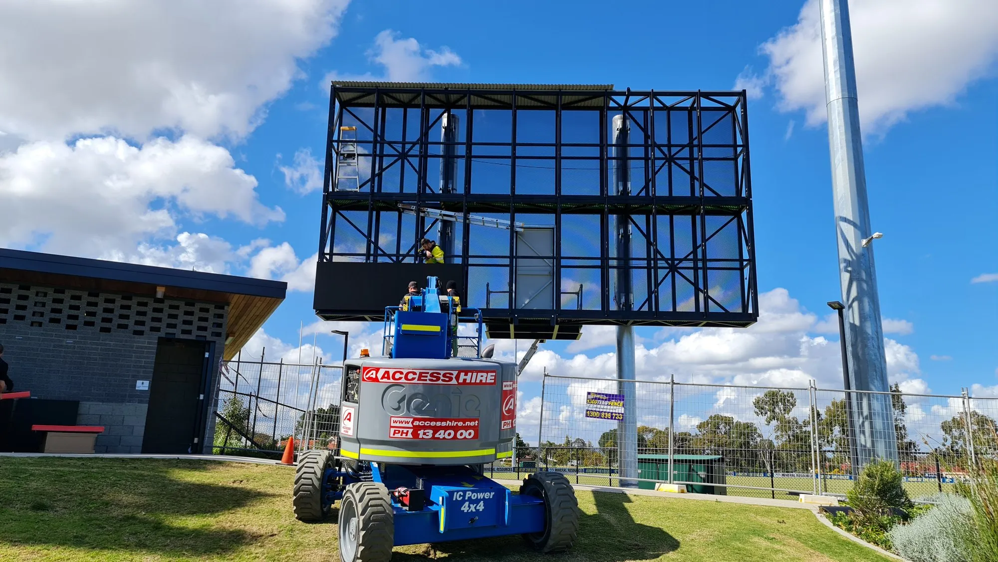 An outdoor LED screen on engineered steel posts at a regional Western Australian site, with a Focus AV van parked alongside during commissioning