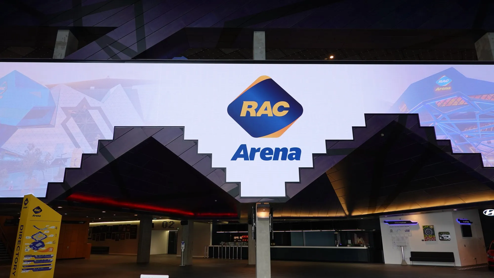 RAC Arena's LED lattice carrying the arena logo against the night sky